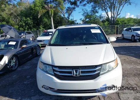 2015 Honda Odyssey Touring/Touring Elite z USA, uszkodzony, nr VIN 5FNRL5H98FB082309